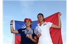 EASTBOURNE, ENGLAND - JUNE 21:  Hao-Ching and Yung-Jan Chan of Chinese Taipei pose with the trophy after beating Martina Hingis of Switzerland and Flavia Pennetta of Italy during their Women's Doubles Finals match on day eight of the Aegon International at Devonshire Park on June 21, 2014 in Eastbourne, England. (Photo by Jan Kruger/Getty Images)